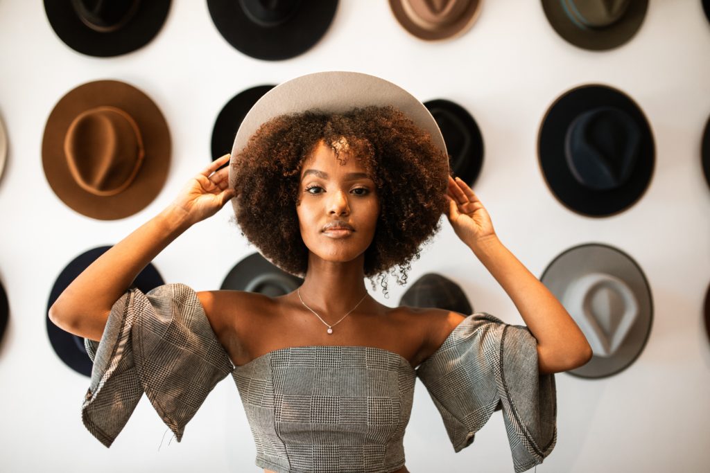 Black girl wearing hat